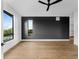 Bedroom with large windows and ceiling fan at 5258 Lions Paw St, Castle Rock, CO 80104