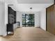 Bright dining area with modern lighting fixture, sleek cabinets, and large window offering outdoor views at 5258 Lions Paw St, Castle Rock, CO 80104