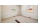 Bright bedroom with carpeted floor and a double set of windows for natural light at 4100 Fenton St, Denver, CO 80212