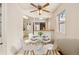 Cozy dining area features modern table set and a view into the kitchen at 4100 Fenton St, Denver, CO 80212