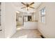 Cozy dining area featuring a stylish ceiling fan and a view into the kitchen at 4100 Fenton St, Denver, CO 80212