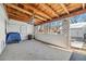 Covered patio with wood paneled ceiling and walls offering outdoor living space at 4100 Fenton St, Denver, CO 80212