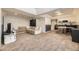 Cozy basement living space featuring a sectional couch and ample room for entertainment at 2448 S Galapago St, Denver, CO 80223