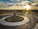 Artistic sculpture and meticulously landscaped roundabout create an inviting entrance to the community at 24374 E 42Nd Ave, Aurora, CO 80019
