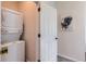 Efficient laundry area with a stacked washer and dryer unit and a convenient location in the home at 24374 E 42Nd Ave, Aurora, CO 80019