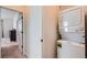 Efficient laundry area with a stacked washer and dryer unit, maximizing space in the home at 24374 E 42Nd Ave, Aurora, CO 80019