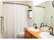 Well-lit bathroom with a double sink vanity, clean lines, and functional layout for a convenient experience at 992 Burning Bush Pt, Monument, CO 80132
