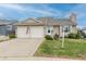 Charming home with two-car garage, neat landscaping, and welcoming entrance offers suburban living at 4369 E 127Th Way, Thornton, CO 80241