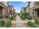 Well-maintained backyard with landscaping and a sidewalk at 15476 W 64Th Loop # C, Arvada, CO 80007