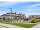 Community pool with seating areas and landscaping at 15476 W 64Th Loop # C, Arvada, CO 80007
