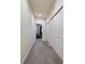 Hallway with closet and a view to a sitting area at 15476 W 64Th Loop # C, Arvada, CO 80007