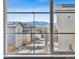 A view from the house's window of the neighborhood and the mountains at 8846 Yates Dr, Westminster, CO 80031