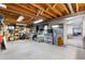 Unfinished basement for storage featuring an open ceiling and concrete floor at 7583 W Trail South Dr, Littleton, CO 80125