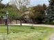 Lovely two-story brick home with attached two-car garage on spacious, tree-filled lot at 7583 W Trail South Dr, Littleton, CO 80125