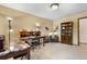 Comfortable study with writing desks, comfortable armchair, and bookshelves at 7583 W Trail South Dr, Littleton, CO 80125