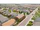 Aerial view of a residential neighborhood showcasing well-maintained homes, streets, and green spaces at 1836 Taos St, Brighton, CO 80603