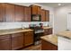 Kitchen with stainless steel oven and appliances and a white subway tile backsplash at 1836 Taos St, Brighton, CO 80603