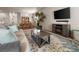 Comfortable living room flows into the dining area, creating an inviting space at 1836 Taos St, Brighton, CO 80603
