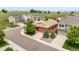 Beautiful street view of craftsman style homes with well-manicured lawns and lush landscaping at 1836 Taos St, Brighton, CO 80603