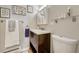 Bathroom with dark vanity, toilet and medicine cabinet at 2231 S Vaughn Way # 305B, Aurora, CO 80014