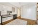 Bedroom with home office setup and large closet at 2231 S Vaughn Way # 305B, Aurora, CO 80014