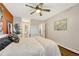 Main bedroom with ceiling fan and view of bathroom at 2231 S Vaughn Way # 305B, Aurora, CO 80014