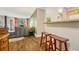 Kitchen features a breakfast bar and view into living room at 2231 S Vaughn Way # 305B, Aurora, CO 80014