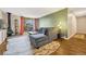 Bright living room with fireplace and access to balcony at 2231 S Vaughn Way # 305B, Aurora, CO 80014