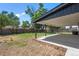 Large, partially xeriscaped backyard with a covered patio and fenced perimeter at 1179 Salem St, Aurora, CO 80011