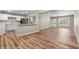 Bright, open living space with a modern kitchen, hardwood floors, and neutral paint at 1179 Salem St, Aurora, CO 80011