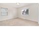 Bright bedroom with two windows and neutral carpet at 2986 S Elm St, Denver, CO 80222