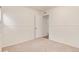 Bedroom with carpet and open door to hallway at 2986 S Elm St, Denver, CO 80222