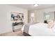 Airy bedroom with comfortable furnishings, tasteful decor, and an ensuite bathroom at 2986 S Elm St, Denver, CO 80222