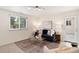 Cozy living room featuring ample natural light, comfortable seating, and a view of the outdoors at 2986 S Elm St, Denver, CO 80222
