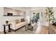 Inviting living room with wood floors, comfortable seating, an open layout, and bright lighting at 2986 S Elm St, Denver, CO 80222