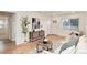 Spacious living area with neutral walls, wood floors, contemporary furniture, and an open layout at 2986 S Elm St, Denver, CO 80222