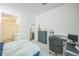 Bedroom with desk, carpet, and basic furniture at 1111 S Garrison St # 202, Lakewood, CO 80232