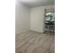 Minimalist bedroom with neutral carpet, a private balcony, and ample natural light at 1111 S Garrison St # 202, Lakewood, CO 80232