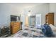 Bedroom with large bed and dresser at 1111 S Garrison St # 202, Lakewood, CO 80232
