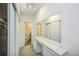 Hallway with large closet and access to bathroom at 1111 S Garrison St # 202, Lakewood, CO 80232