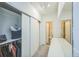 Hallway with large closet and access to bathroom at 1111 S Garrison St # 202, Lakewood, CO 80232