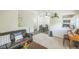 Open-concept living area with seamless transitions to dining and kitchen, and a comfortable atmosphere at 1111 S Garrison St # 202, Lakewood, CO 80232