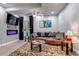 Inviting living room with a modern fireplace, plush seating, and stylish décor for comfortable living at 6715 Raritan Dr, Denver, CO 80221