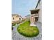 Backyard featuring a well-manicured lawn, gravel landscaping, wooden fence and a wooden staircase leading to a deck at 4666 S Malaya Ct, Aurora, CO 80015