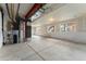 Unfinished basement with exposed piping and access to natural light at 4666 S Malaya Ct, Aurora, CO 80015