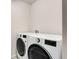 Laundry room featuring a new washer and dryer at 4666 S Malaya Ct, Aurora, CO 80015
