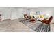 Bright living room with neutral walls, comfortable seating, and stylish decor at 4666 S Malaya Ct, Aurora, CO 80015