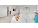 Relaxing main bedroom featuring modern decor and bright natural light at 4666 S Malaya Ct, Aurora, CO 80015