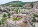 Beautiful aerial view of a secluded home featuring a unique fenced yard with lush green space at 6201 Rain Dance Trl, Littleton, CO 80125