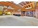 Large unfinished basement featuring exposed beams, pink insulation, and ample storage space at 6201 Rain Dance Trl, Littleton, CO 80125